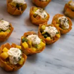 Crispy filo pastry baskets with vegetables and thyme cream, appetizer